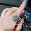 Anillo vintage de gema azul mar en forma de gota de agua chapado en oro de 18 quilates Kingdee danza joyería floral circón anillo abierto aretes de diamante flash
