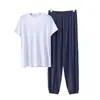 Nuevo traje casual de seda helada para hombre de verano, pantalones jogger de manga corta de verano, talla grande y holgada