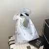 Estampa de Laço 2026 Primavera Novo Estilo Bonito e Estiloso Grande Capacidade Versátil Simples Bolsa de Ombro de Mão Bolsa Transversal