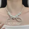 Colar de Pérolas com Laço Estilo Francês Inspirado em Chanel para Mulheres, Corrente de Clavícula Única e Elegante com um Toque Ousado e de Alto Padrão