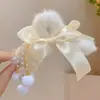 Presilha de Cabelo de Pelúcia com Laço e Franja Novo Estilo 2026 Grampo Feminino para Outono e Inverno para a Parte de Trás da Cabeça Versátil Presilha de Cabelo Fofa