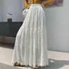 Falda de encaje estilo coreano para mujer, nuevo modelo otoño e invierno 2026, cintura elástica, línea A adelgazante, falda larga tipo paraguas fluida