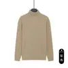 Tejido de punto de cuello alto para hombre de otoño e invierno, color liso, lujo ligero, sensación de alta gama, suéter de manga larga, casual de negocios, capa base cálida