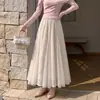 Saia de malha com patchwork bordado em renda, outono, cintura alta, modeladora, fluida, casual, barra larga, saia evasê, saia longa