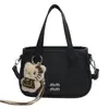 Bolsa de Mão Pequena Quadrada Estilosa Simples Retrô de Nicho Nova para Primavera 2026 Bolsa Transversal Estética de Alto Valor para o Dia a Dia de Mulheres