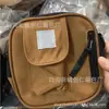 Bolsa Quadrada Pequena Carhartt Transfronteiriça Bolsa de Ombro Transversal Bolsa Hip-Hop Disco Masculina e Feminina Carteira de Lona Bolsa Moderna para Celular Atacado