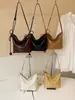 Bolso retro simple transfronterizo para mujer 2026 nuevo bolso de hombro cruzado casual versátil para el trabajo y los desplazamientos bolso tipo cubo