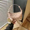 Nuevo bolso de mano de lunares de nicho transfronterizo, bolso de hombro casual y simple, bolso cruzado moderno, fresco y dulce