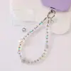 Cadena para teléfono de cristal con lazo incrustado de diamantes de alta gama, minimalista y lujosa, con un diseño fresco y delicado, que sirve como correa para teléfono, accesorio para la muñeca o adorno colgante