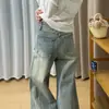 Diseño de pierna ancha pantalones acampanados rotos y desgastados para mujer estilo callejero americano adelgazantes de cintura alta jeans de microcampana modernos