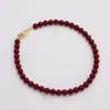 Colar de Pérolas Vermelhas Sintéticas para Mulheres, Corrente Versátil e de Alto Padrão para Suéter, Colar para Clavícula com Temperamento Energético para Outono e Inverno, Novo Estilo Chinês