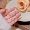 Cadena de clavícula ligera de lujo con forma de corazón palpitante, nuevo collar de acero de titanio estilo INS 2024, exquisita cadena de cuello con microincrustaciones para mujer