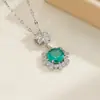 Popular y moderno conjunto de joyería para mujer con una piedra principal de color dorado y verde azulado, que incluye un collar, pendientes y un anillo - Suministro al por mayor para ventas transfronterizas