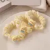 Leite amarelo urso intestino grosso anel de cabelo acessórios para o cabelo coração da menina doce vento corda de cabelo estudantes de alta elasticidade rabo de cavalo elástico elástico atacado