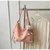 Bolsa de Grande Capacidade para Mulheres 2026 Nova Textura de Alto Padrão Moda Nicho Bolsa de Ombro Único Transversal Mochila Multifuncional