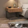 Mesita de noche negra con un toque de lujo ligero y alta gama, adecuada para uso en el dormitorio del hogar como mueble de noche de repuesto, pequeño mueble de almacenamiento minimalista italiano para hotel