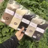 26 Calcetines Caídos de Media Pantorrilla para Mujer Otoño Invierno Calcetines de Pelo de Camello Calidez para Mujer Otoño Invierno Venta al por Mayor