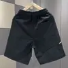 Verano 2026 Nuevos Pantalones Casuales Cómodos de Secado Rápido de Cinco Puntos para Hombre Estilo Japonés Simple Patchwork Moda Shorts Deportivos Tendencia