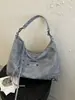Estilo Coreano Gran Capacidad Alta Apariencia Bolsa de Axila para el Trabajo y el Viaje Diario Nuevo Verano 2026 Remache Elegante Bolso Cruzado para Motocicleta