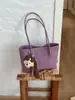 Bolso tejido popular transfronterizo 2026, bolso casual simple de gran capacidad para mujer, bolso de hombro tipo coreano para llevar debajo del brazo