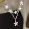 Collar de estrella de diamante flash para mujer estilo ins nicho diseño apilado de doble capa lujo ligero alta gama temperamento super hada cadena clavicular