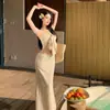 Traje Estilo Vacaciones en la Playa para Mujer 2026 Nuevo Estilo Conjunto de Dos Piezas con Top de Tubo Falda Larga a Cuadros de Cintura Alta que se Ajusta a la Cadera