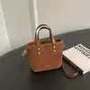 Bolso de gamuza para mujer, nuevo estilo 2026, color Melard de moda, adecuado para el trabajo, bolso tote pequeño, bolso de hombro, bolso cruzado, bolso tipo cubo
