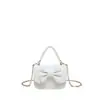 Bolso de cadena para mujer de estilo coreano de alta gama, mini, con lazo lindo, perlas, para un solo hombro, bandolera, para auriculares y monedas