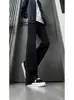 Jeans masculino vintage estilo americano com vibe de rua, calças retas soltas versáteis e com barra bootcut da nova coleção de primavera e outono para homens