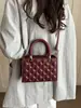 Nuevo modelo de otoño temprano 2026, bolso de mano sencillo con patrón de diamantes para mujer, bolso cruzado de moda con textura, bolso de hombro, bolsos de mujer al por mayor