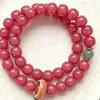 Venta directa de fábrica de pulseras de semilla de bodhi de jade rosa de doble vuelta, cuentas de raíz de bodhi Primavera de las Cuatro Estaciones de color melocotón para meditación y colección, venta al por mayor