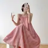 Vestido largo rosa con tirantes para mujer, nuevo estilo de verano, vestido de playa para vacaciones en la costa con diseño de cuello halter, vestido único