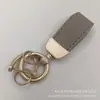 Novo Mini Chaveiro de Metal para Carro Estilo Francês com Padrão de Cabra, Pingente Acessório, Casal Personalizado Fofo para Bolsa Pequeno Presente