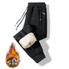 Ropa Exterior de Lana de Cordero al por Mayor Pantalones Gruesos con Forro de Polar para Hombre Otoño e Invierno Nuevos Pantalones Casuales Elásticos Sueltos Cálidos Pantalones Cálidos