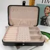 Caja de joyería de cuero de alta calidad nueva de gran capacidad portátil para anillos, aretes, tachuelas, joyería, almacenamiento de collares LG7234