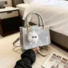 Bolsos pequeños transfronterizos 2026 verano nuevos bolsos de mano, modernos y a la moda, diseño de nicho coreano, bolsos cruzados para mujer