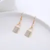 Pendientes de venta caliente europeos y americanos, diseño de nicho femenino, nuevo estilo, pendientes de aleación, moda, todo-partido, pendientes elegantes, modernos