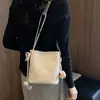 Bolsa transversal tecida para o dia a dia, coreana, versátil, nova, grande capacidade, inclinada, sol, feminina, tipo balde, ombro único, diária, verão 2026