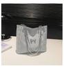 Bolso de mano popular de gran capacidad para mujer, nuevo bolso de hombro informal de alta gama de 2024, bolso de viaje para estudiantes universitarios.