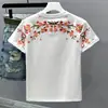 2026 Primavera/Verano Nueva Marca Tendencia Estilo Chino Camiseta de Manga Corta Holgada con Bordado de Flor de Ciruelo para Hombres y Parejas Verano Manga Media