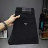 Jeans preto de alta gama da marca italiana para homens, corte slim, elástico, respirável, calça casual, novo modelo de primavera