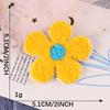 Logotipo bordado toalla de girasol de cuatro colores insignia bordada etiqueta de tela accesorios de ropa parche cuenta de mano diy pegatina de tela bordada