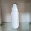 En stock, botella con pulverizador para crema corporal blanca de 100/120/150 ml, para el cuidado de la piel, con base redonda transparente y fina.