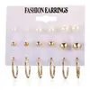 Venta caliente transfronteriza pendientes de moda creativos personalizados conjunto pendientes de flor corazón mariposa piedra blanca perla venta directa de fábrica