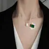 Celebridad de Internet Guanhe Oro Diamante Completo Trébol de Cuatro Hojas Collar para Mujer Chapado en Oro de 18K Elegante a la Moda Sin Decoloración Joyería Simple y Elegante