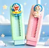 Goma de borrar retráctil con parche de resina de Doraemon, goma de borrar de dibujos animados linda para exámenes de estudiantes, goma de borrar retráctil de empuje