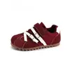 Zapatillas de entrenamiento alemanas para niños 2026 primavera y otoño nuevas zapatillas deportivas de suela plana, zapatillas versátiles casuales con hebilla y colores contrastantes, estilo Forrest Gump