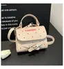 Bolso Cuadrado Pequeño Único de Lunares para Mujer, Nuevo Estilo Primavera 2026, Bolso de Hombro Cruzado de Alta Gama y Elegante, Bolso para Teléfono, Bolso de Mano Pequeño