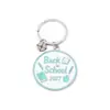 Llaveros personalizados más vendidos transfronterizos, dijes para mochilas, colgantes de aleación para la temporada de graduación, accesorios con temática de campus para las mochilas de los estudiantes