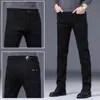 Jeans rectos azules de alta gama de Hong Kong para hombre, pantalones casuales elásticos de marca modernos de corte slim para la primavera de 2022, estilo primavera y otoño